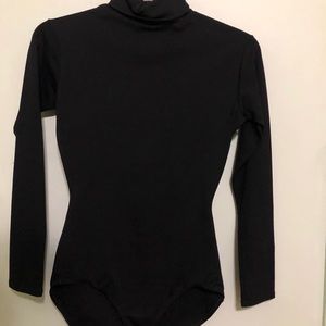 Black turtleneck leotard
